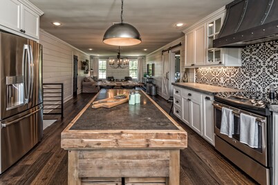 HGTV’s “BARNDOMINIUM” 16 Acres w/ Lake, Outdoor Kitchen, Decks & Playground