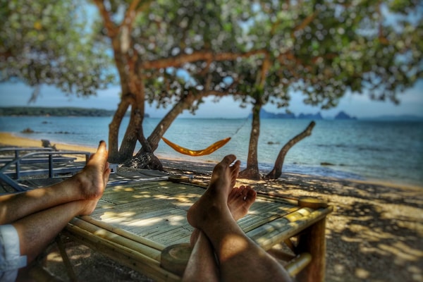 On the beach, sun loungers, beach towels