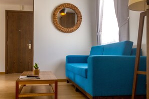 Apartment, 1 Schlafzimmer, Balkon | Wohnzimmer | Flachbildfernseher