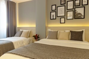 Minibar, bureau, rideaux occultants, chambres insonorisées