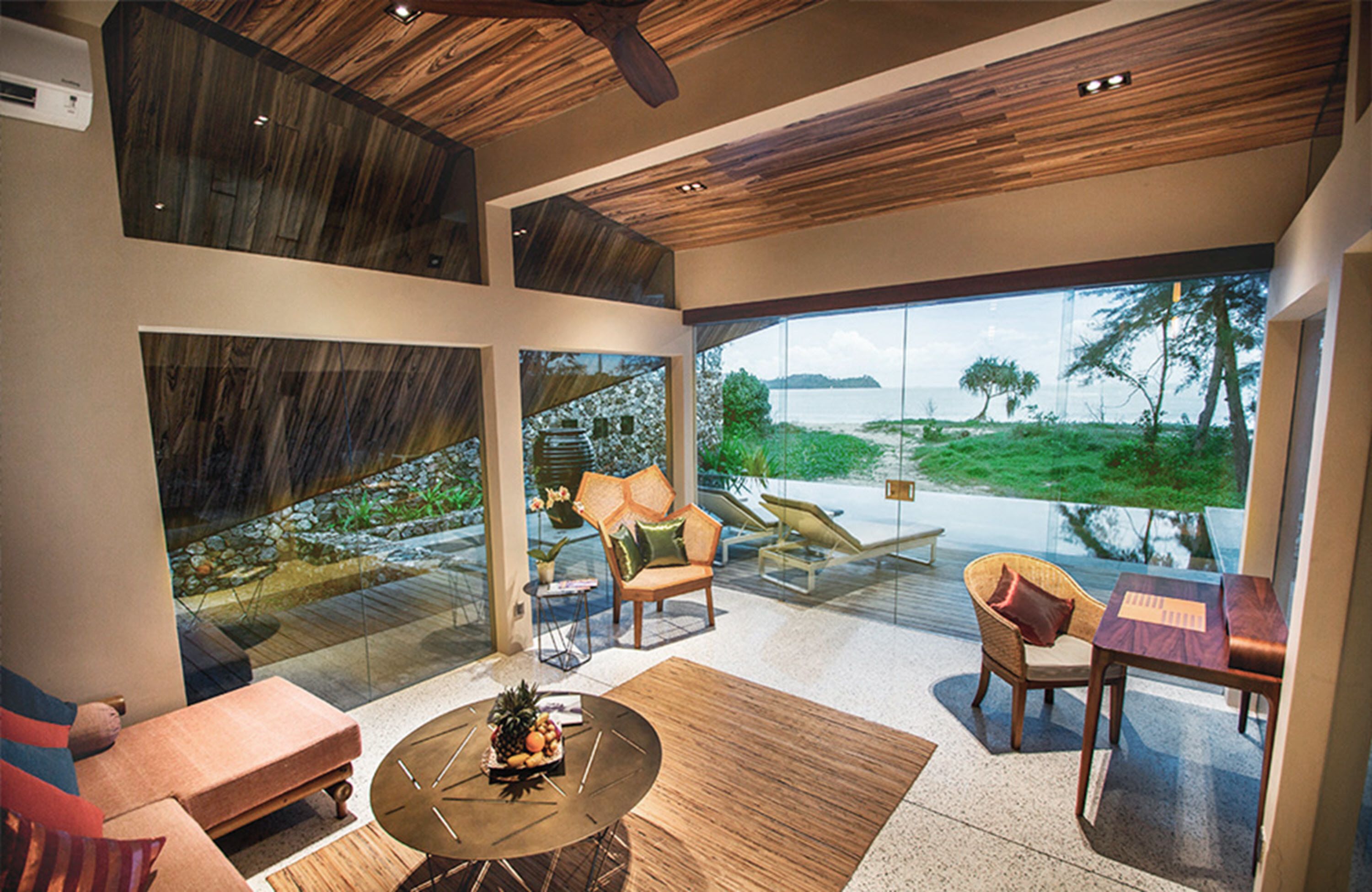 two bedrooms beach front villa | living area | 40-inch smart tv with cable channels, tv