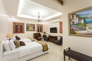 Deluxe Twin Room, City View | In-room safe, individually decorated, desk, laptop workspace