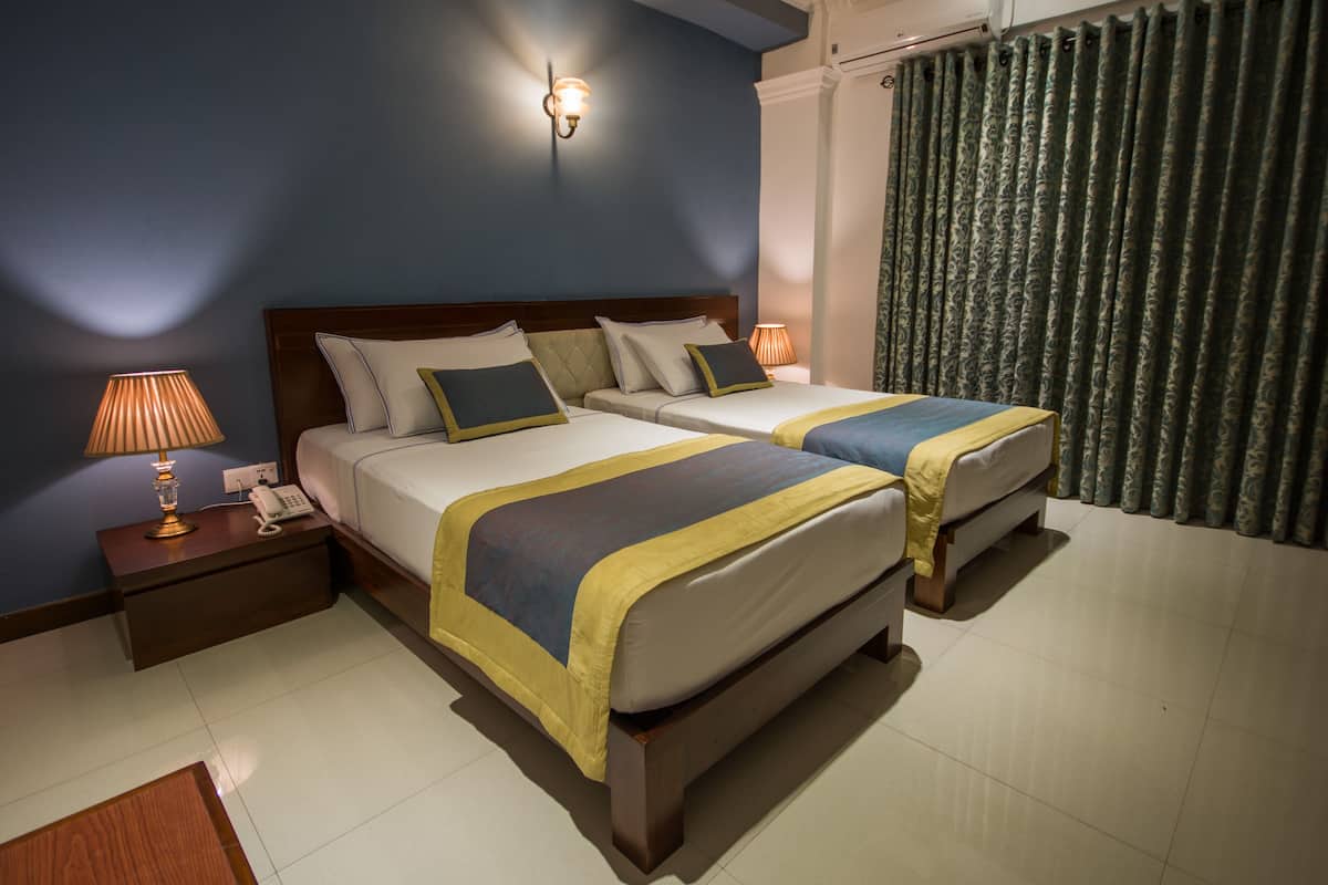 Deluxe Twin with Balcony | 1 bedroom, in-room safe, desk, iron/ironing board