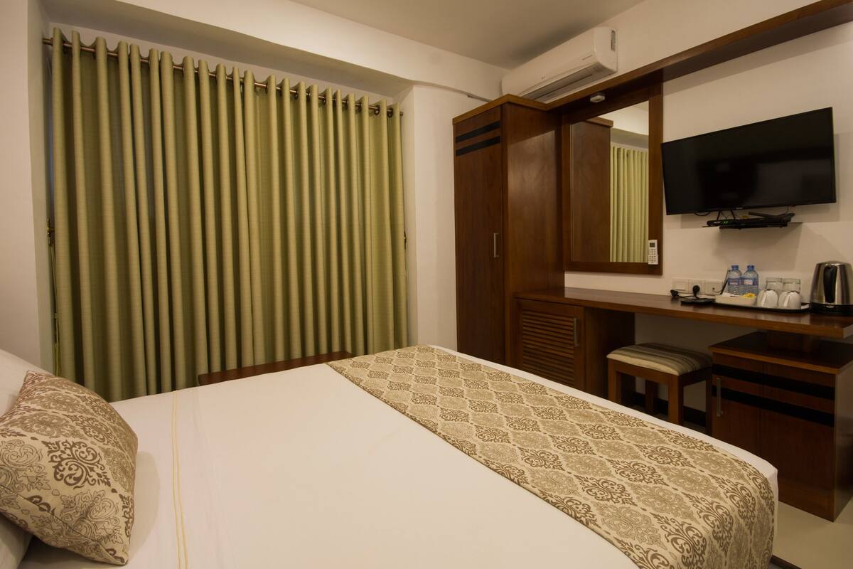 Deluxe Double without Balcony | 1 bedroom, in-room safe, desk, iron/ironing board