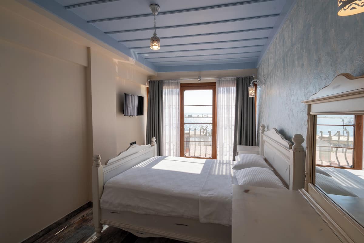 Quarto standard | Roupas de cama premium, frigobar, cofres nos quartos
