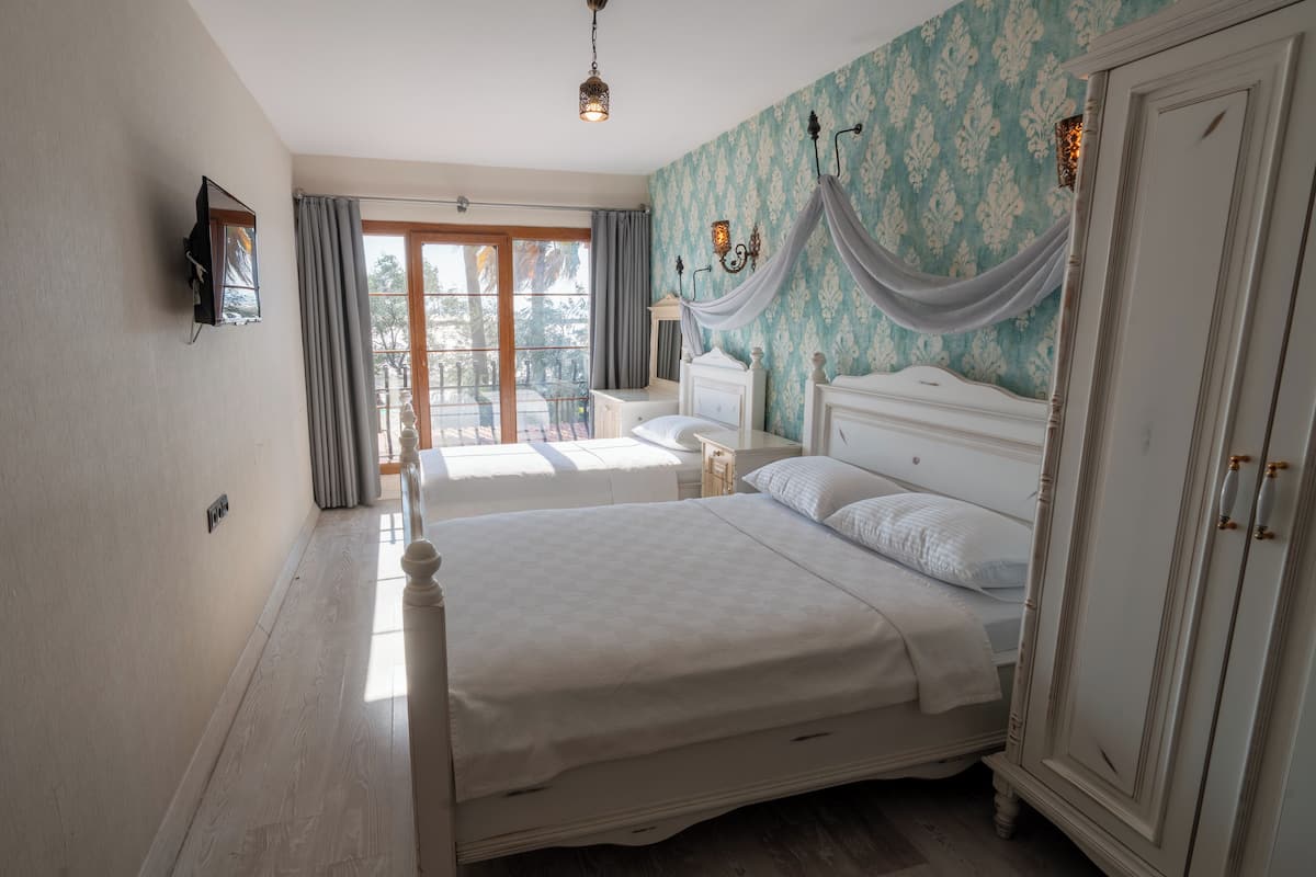 Quarto standard | Roupas de cama premium, frigobar, cofres nos quartos