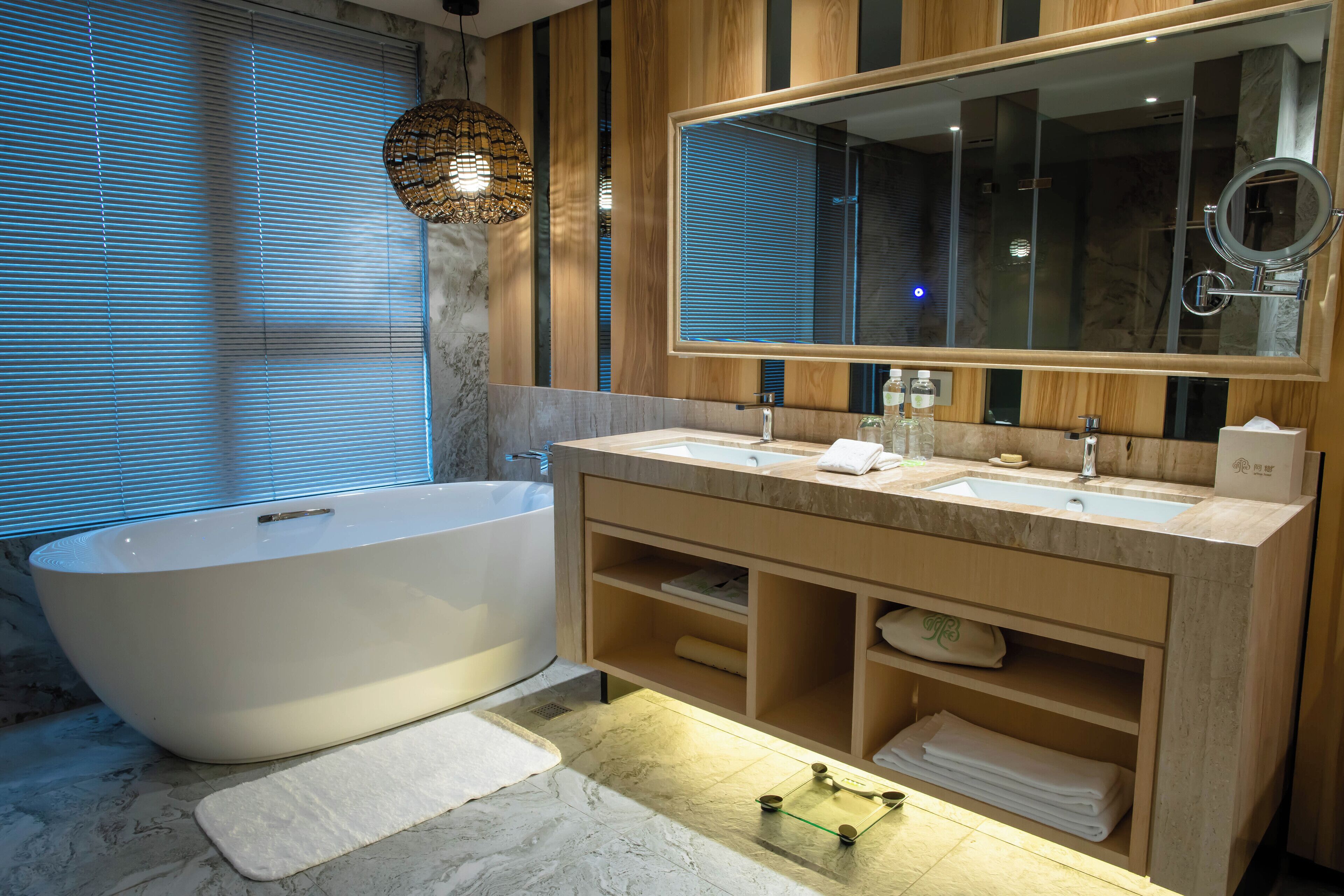 deluxe twin room | bathroom | separate bathtub and shower, deep-soaking bathtub, hair dryer, slippers