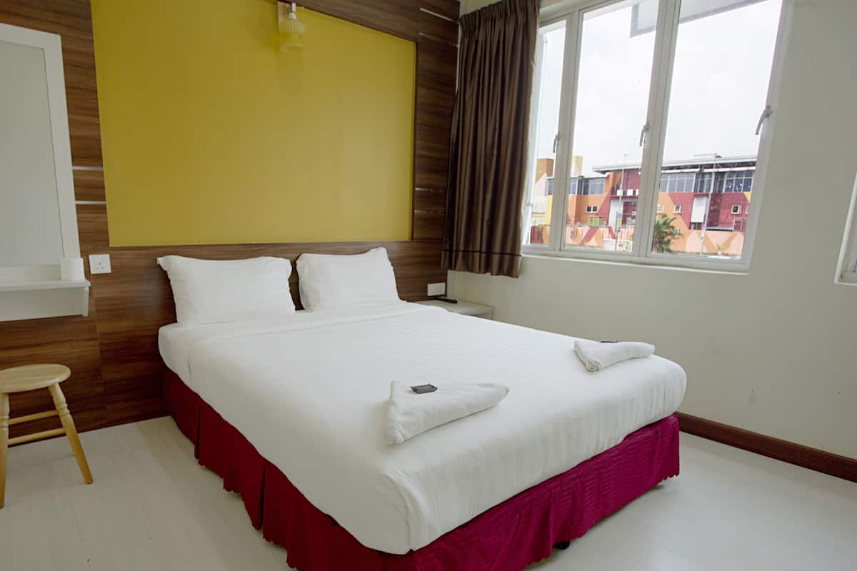 Deluxe kamer | Geluiddichte muren, een strijkplank/strijkijzer, gratis wifi, beddengoed
