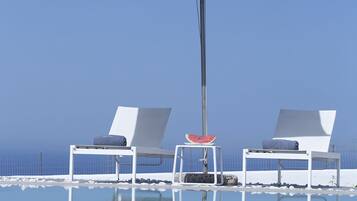 Seasonal outdoor pool, pool umbrellas, sun loungers