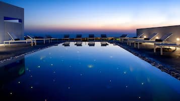 Seasonal outdoor pool, pool umbrellas, sun loungers