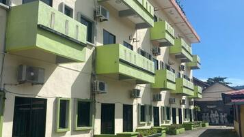 Stylish building with balconies on each floor.