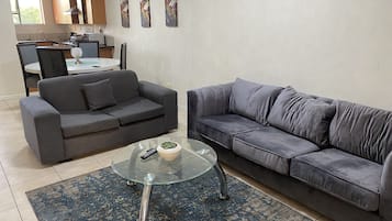 Appartement | Coin séjour | Télévision à écran plat, films à la carte
