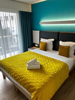 Premium bedding, minibar, desk, soundproofing