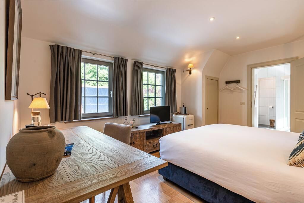 Ropa de cama de alta calidad y minibar 