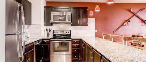 Condo, 2 Bedrooms | Private kitchen | Full-size fridge, microwave, oven, stovetop