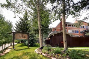 Welcome to Sky Bull Condominiums, featuring a modern design and beautifully landscaped grounds.