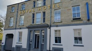 A building with the sign "ROYAL HOTEL" above the entrance. - The Royal Hotel (Jedburgh)
