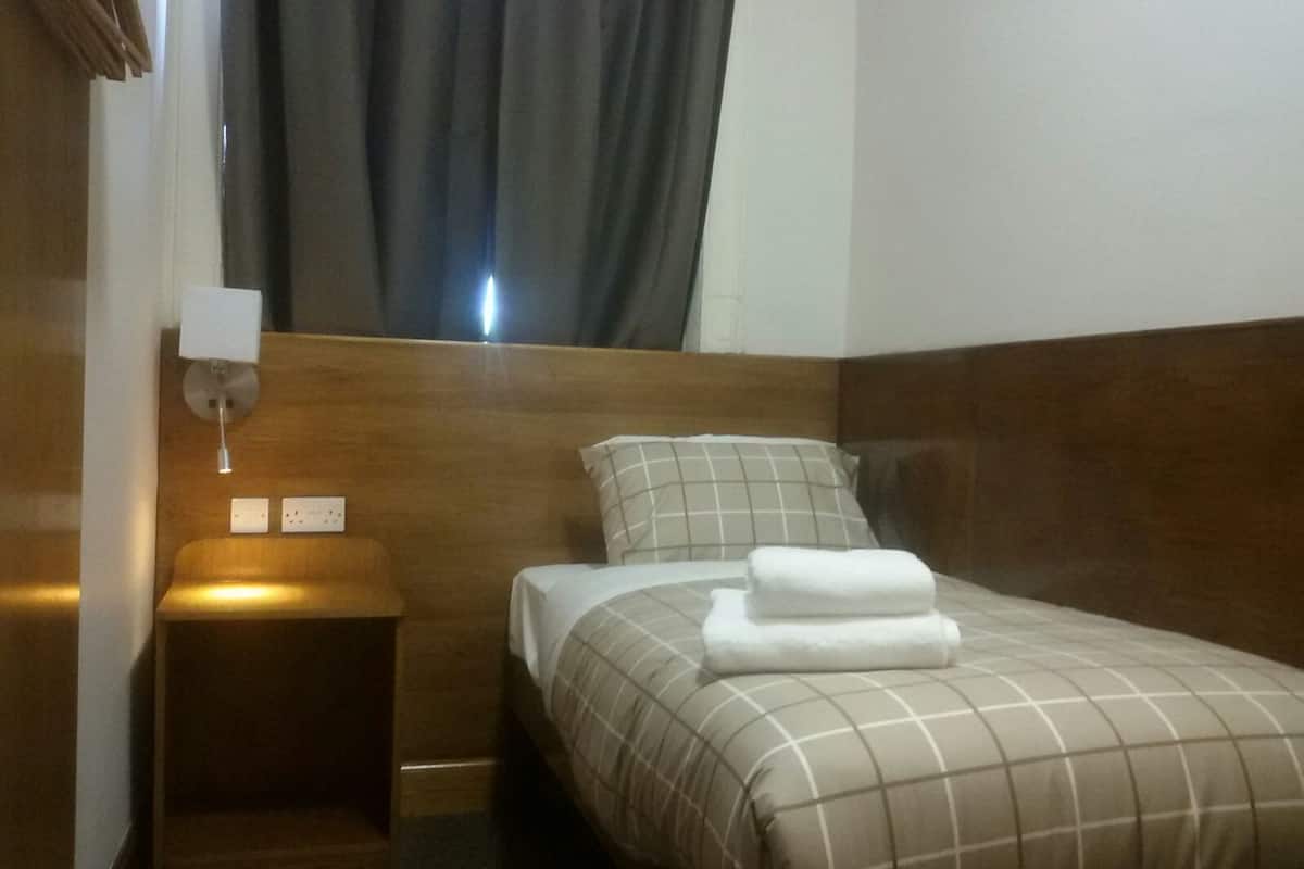 single room, 1 single bed | premium bedding, iron/ironing board, bed sheets