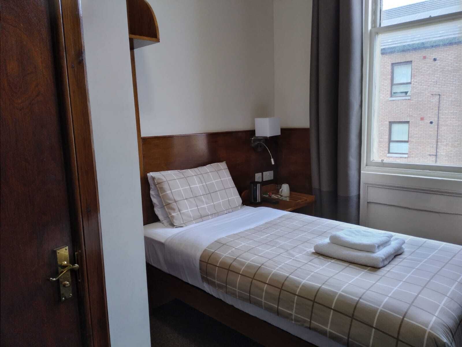 premium bedding, iron/ironing board, bed sheets