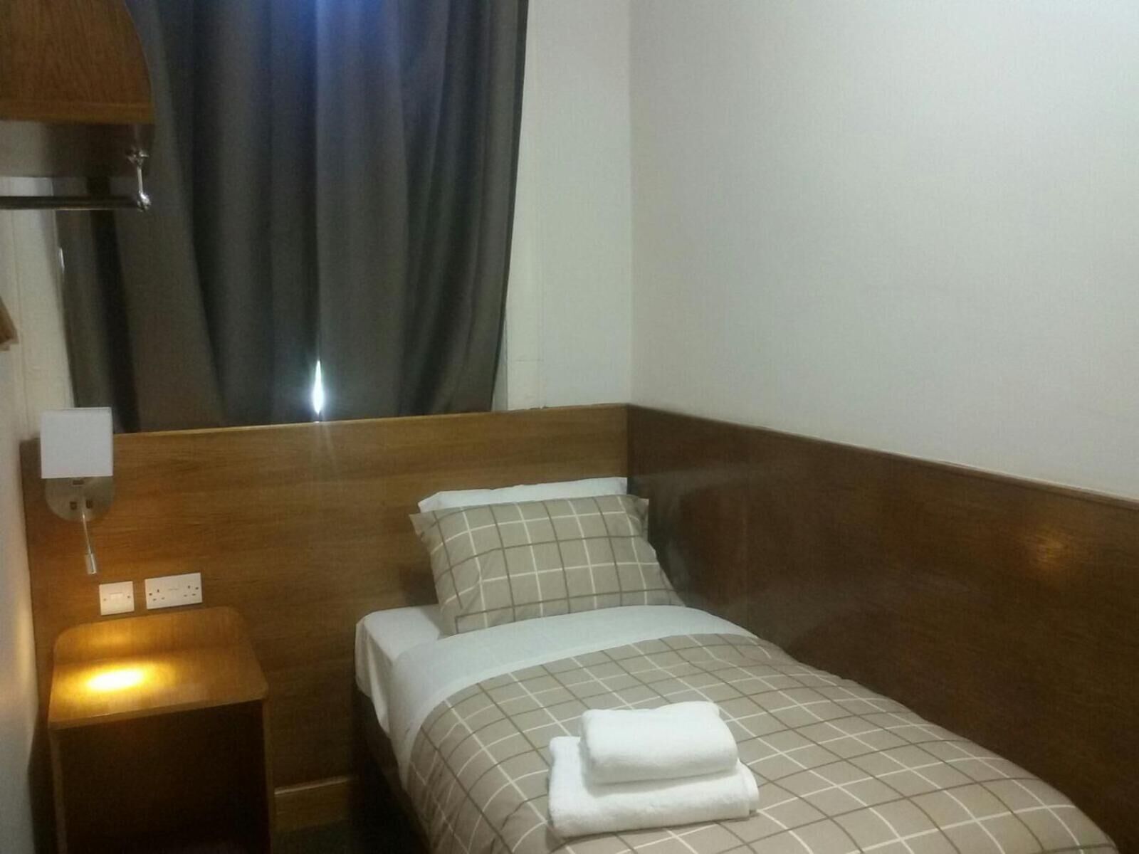 single room, 1 single bed | premium bedding, iron/ironing board, bed sheets