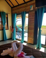 Third Floor Honeymoon, 1 King Bed, Non Smoking Ocean View | Down comforters, pillowtop beds, in-room safe, individually decorated