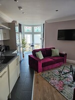 Luxury Apartment, 2 Bedrooms (1 bathroom) | Living area | Flat-screen TV