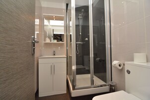 Executive Apartment, 1 Bedroom | Bathroom | Shower, free toiletries, hair dryer, towels