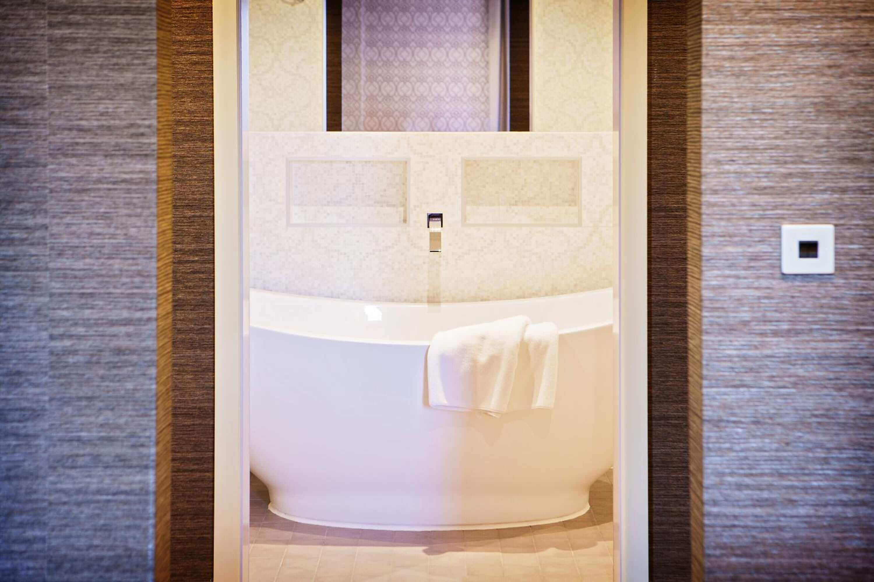 separate bathtub and shower, free toiletries, hair dryer, towels