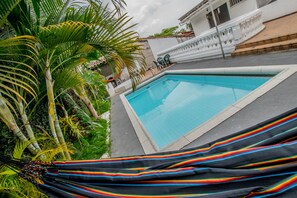 Outdoor pool, pool umbrellas, pool loungers
