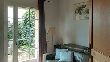 Standard Cottage, 1 Bedroom | Living area | 110-cm flat-screen TV with satellite channels, DVD player