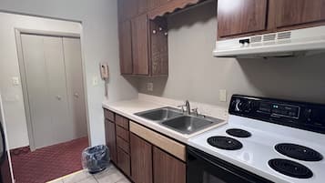 One King Bed, Two Double Beds, Two Bedroom Suites, Non-Smoking | Private kitchen | Mini-fridge, microwave, oven, coffee/tea maker