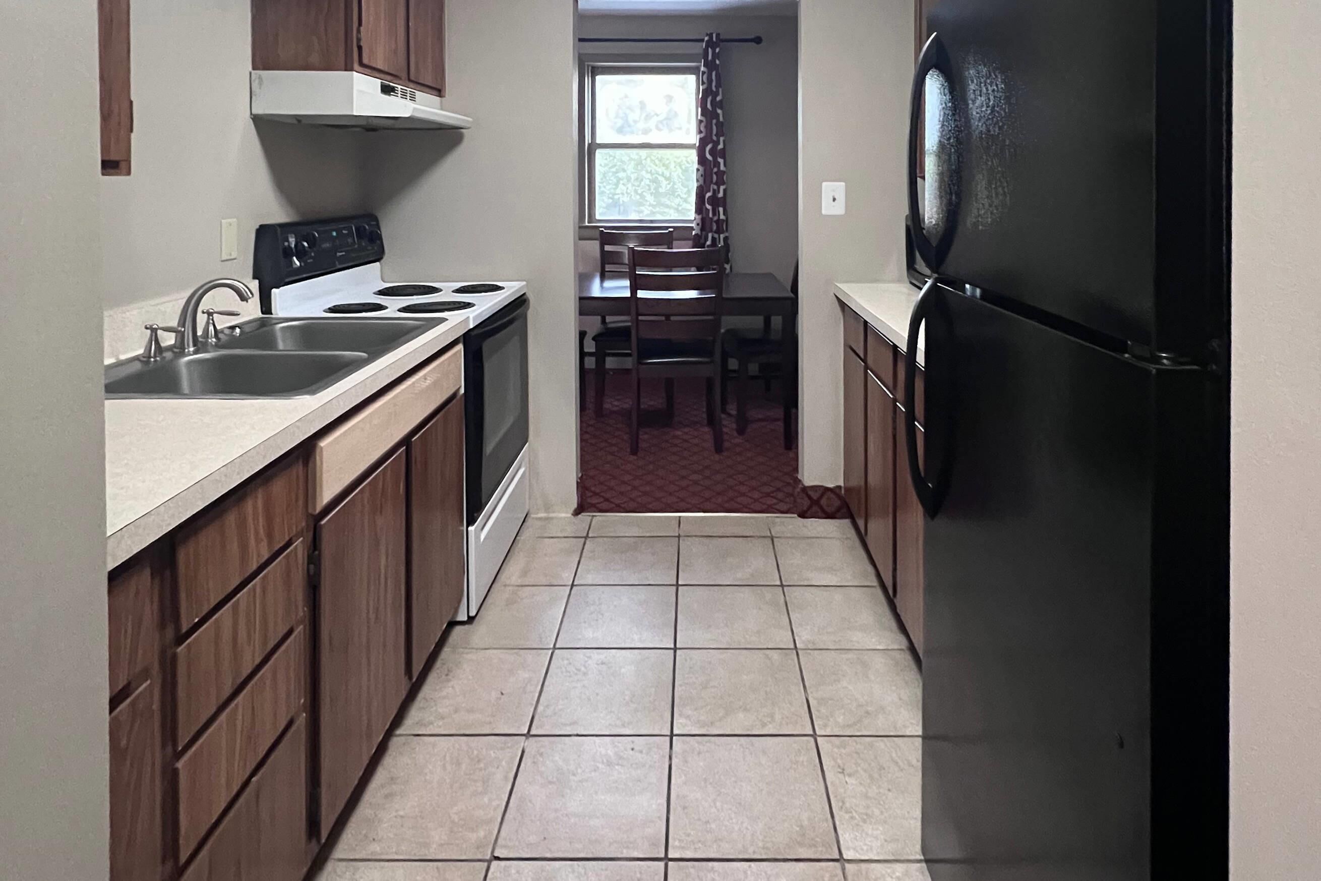 One King Bed, Two Double Beds,  Two Bedroom Suites, Non-Smoking | Desk, laptop workspace, iron/ironing board, free WiFi