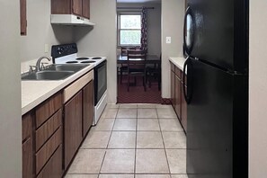 One King Bed, Two Double Beds,  Two Bedroom Suites, Non-Smoking | Desk, laptop workspace, iron/ironing board, free WiFi