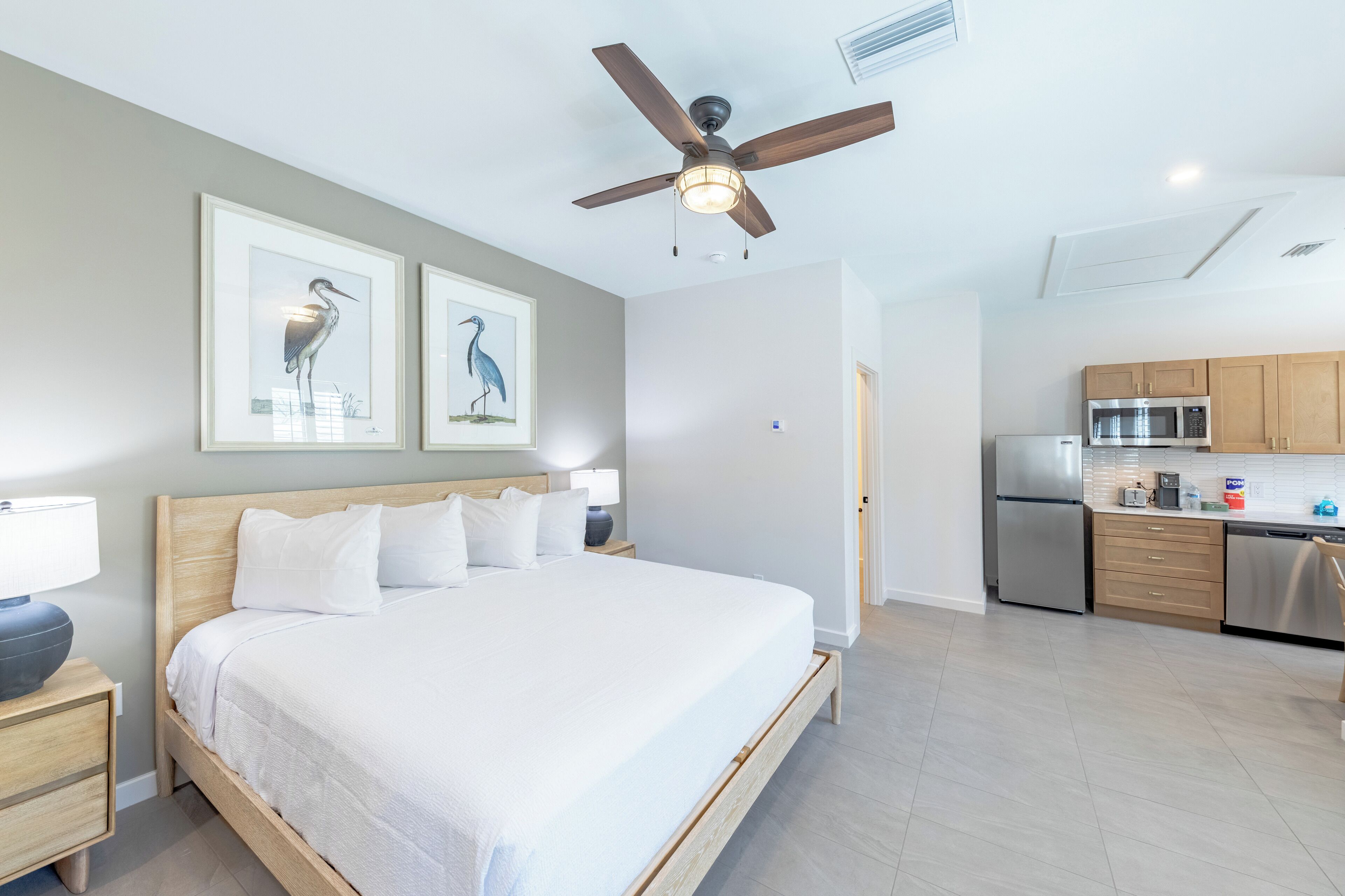 Deluxe Studio, 1 King Bed, Kitchenette | Down comforters, individually decorated, individually furnished