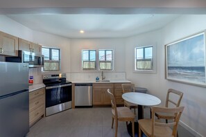 Apartment, 1 King Bed with Sofa bed, Kitchen | Private kitchen | Full-sized fridge, microwave, coffee/tea maker, toaster - The Palmetto Inn (Boca Grande)