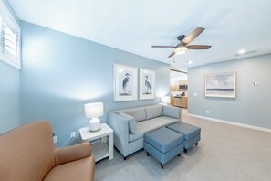 Deluxe Suite, 1 King Bed with Sofa bed, Kitchenette | Living room | 39-inch flat-screen TV with satellite channels, TV