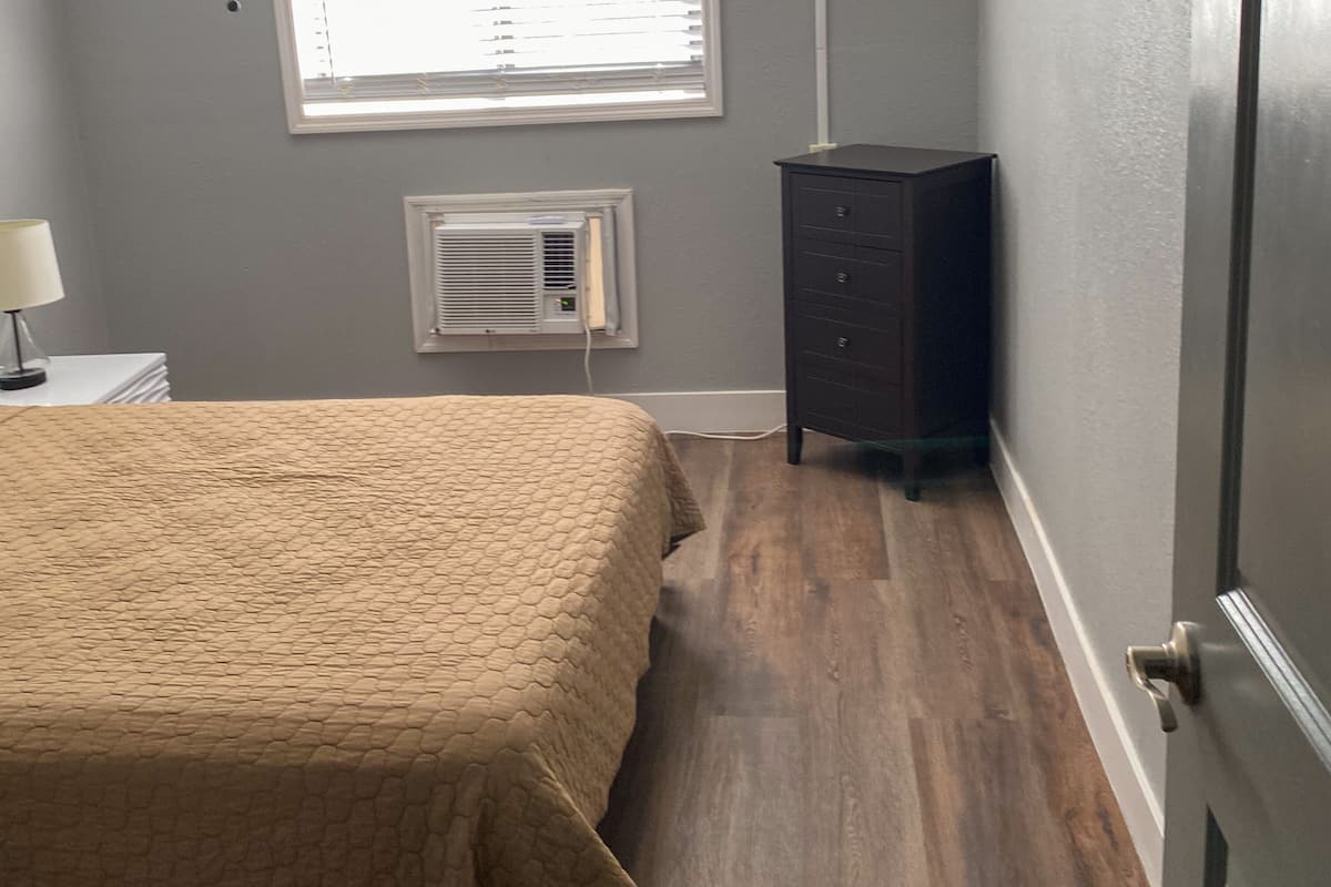 Deluxe Suite, 2 Bedrooms, Kitchen | 1 bedroom, down comforters, individually decorated