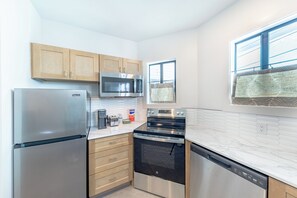 Apartment, 1 King Bed with Sofa bed, Kitchen | Private kitchen | Microwave, coffee/tea maker, paper towels - The Palmetto Inn (Boca Grande)