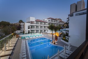 Outdoor pool, pool umbrellas, pool loungers