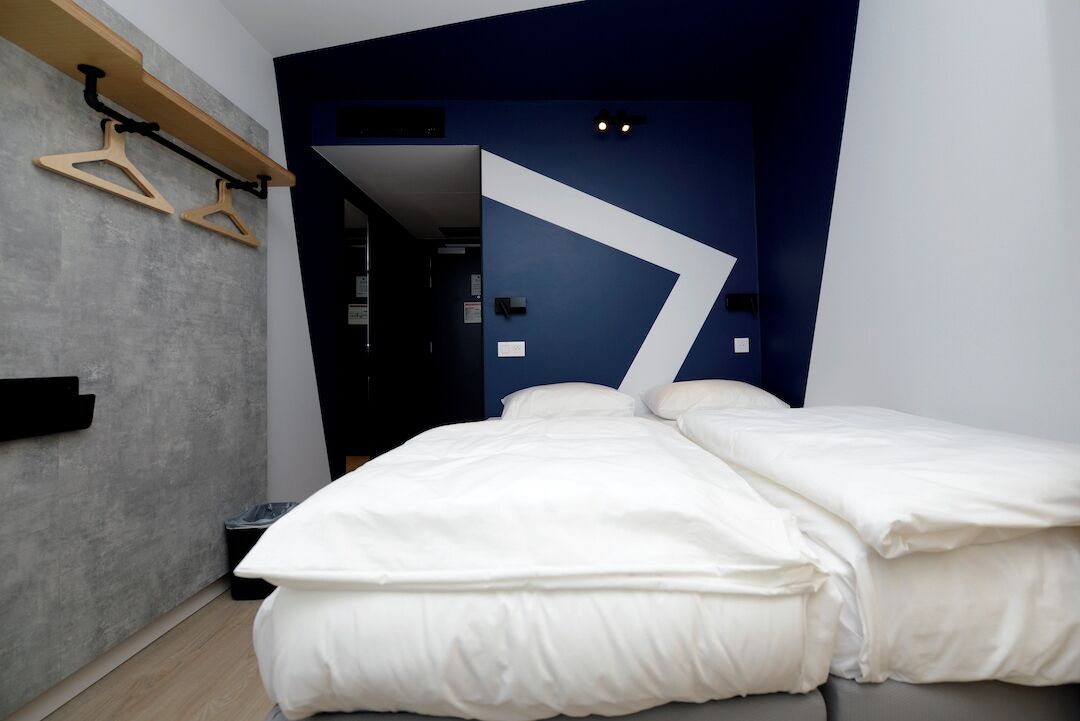 twin room, 2 single beds | blackout curtains, soundproofing, free cots/infant beds, free wifi