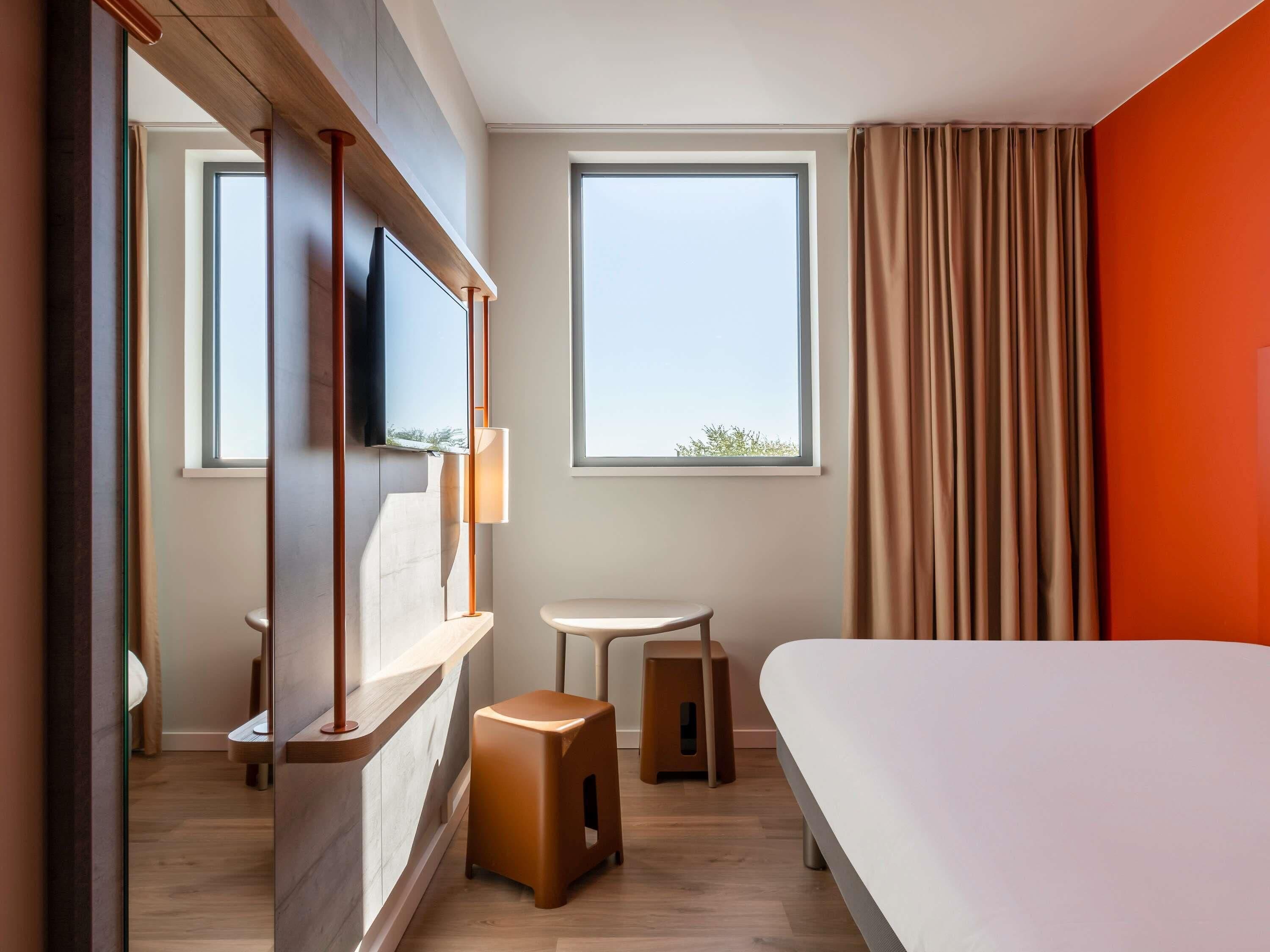 Blackout curtains, soundproofing, free cots/infant beds, free WiFi