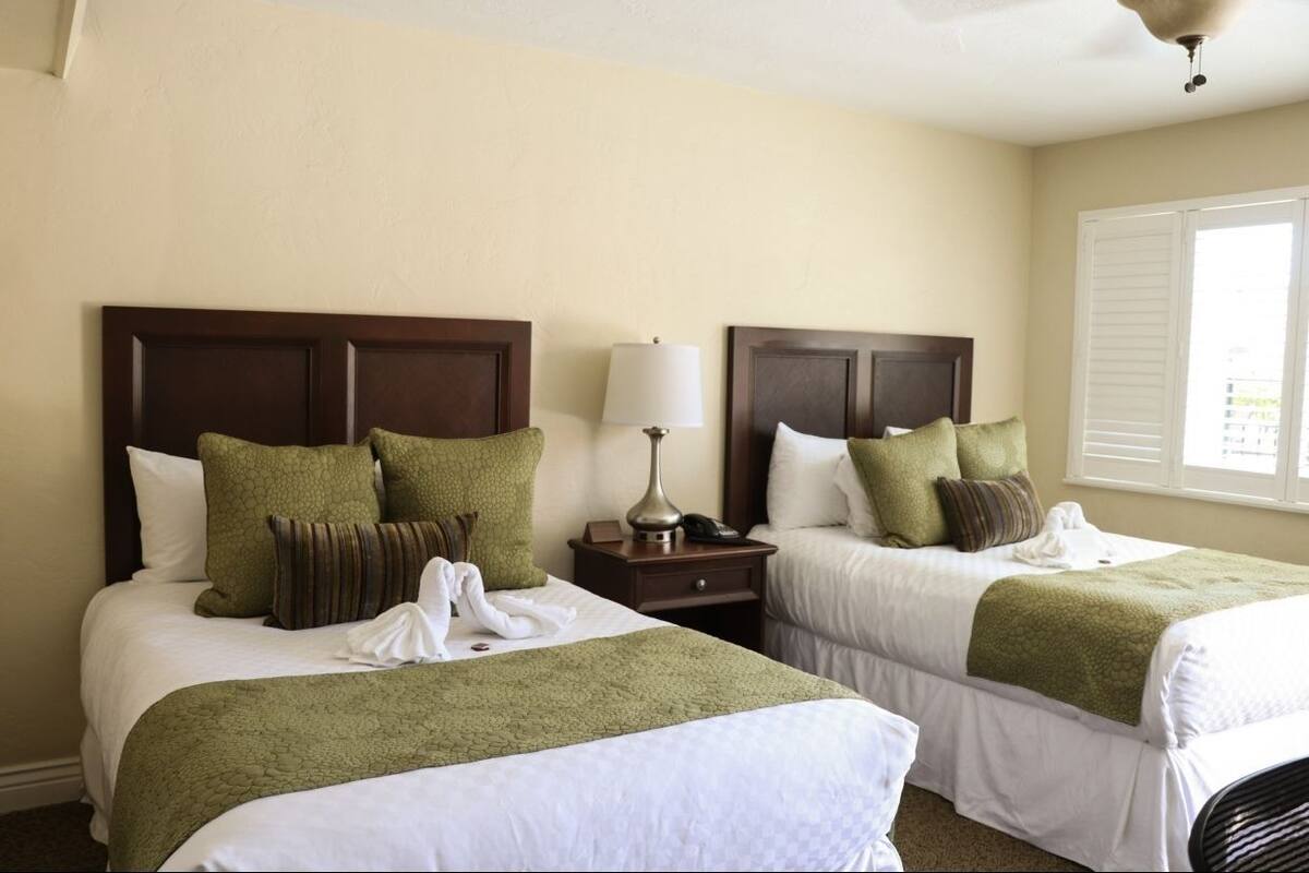 Premium bedding, down duvets, desk, laptop workspace