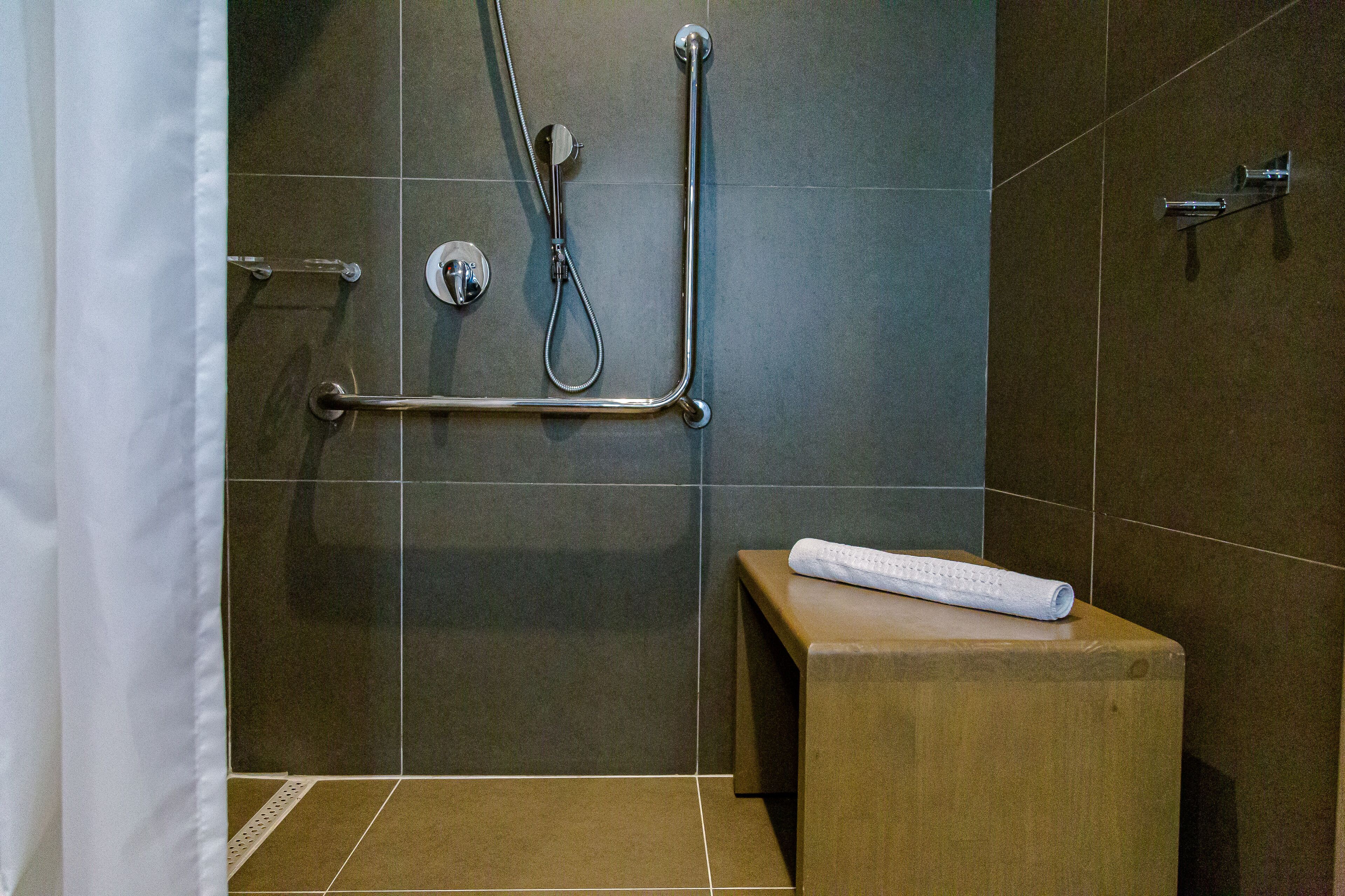 standard room, 1 double bed (adapted) | bathroom | shower, eco-friendly toiletries, hair dryer, towels