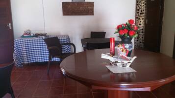 Family Triple Room, 1 Bedroom, Smoking, Hot Tub | In-room dining