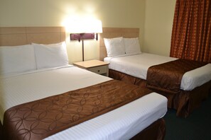 Double Room, 2 Double Beds | Desk, blackout curtains, iron/ironing board, free WiFi - Passport Inn - By The Falls NY (Niagara Falls)