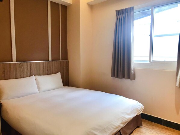 Desk, blackout curtains, free WiFi, bed sheets