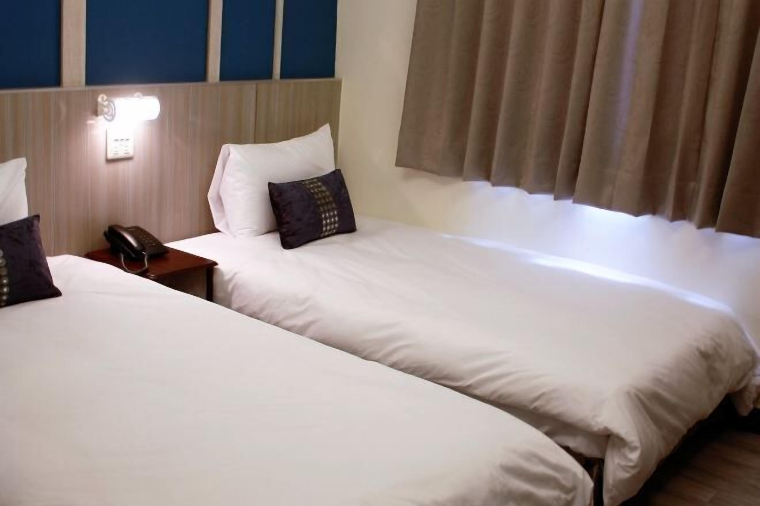 Desk, blackout curtains, free WiFi, bed sheets