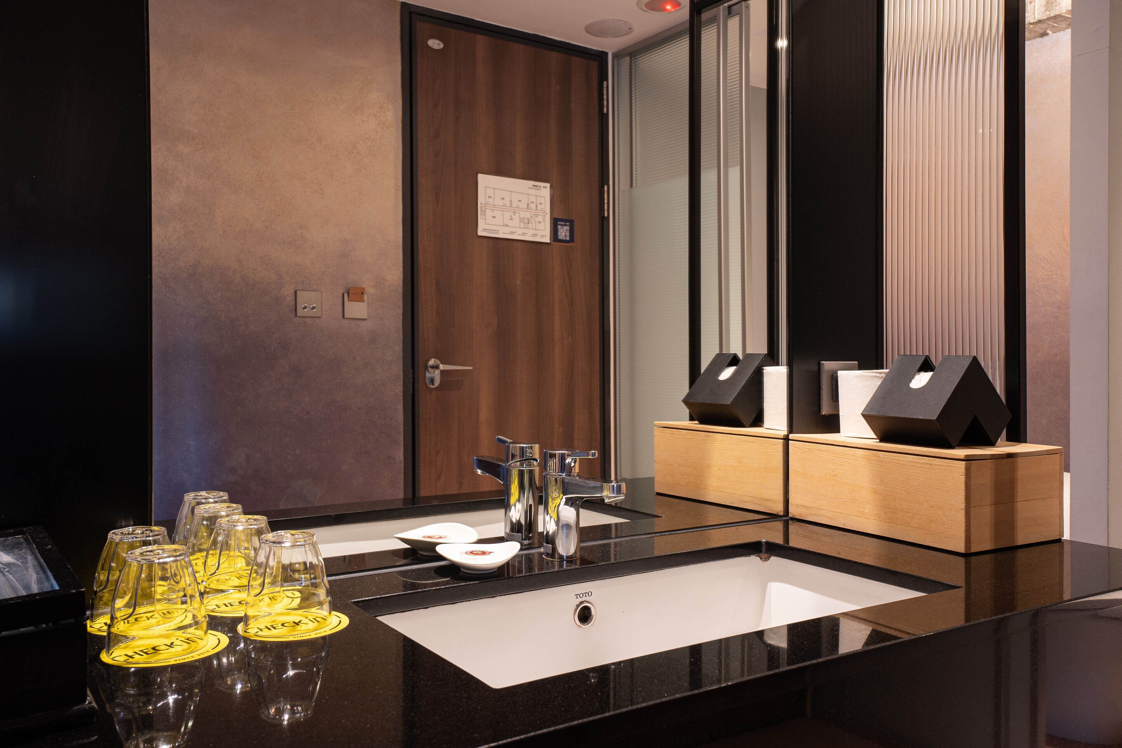 deluxe quadruple room | bathroom | hair dryer, electronic bidet, towels, shampoo