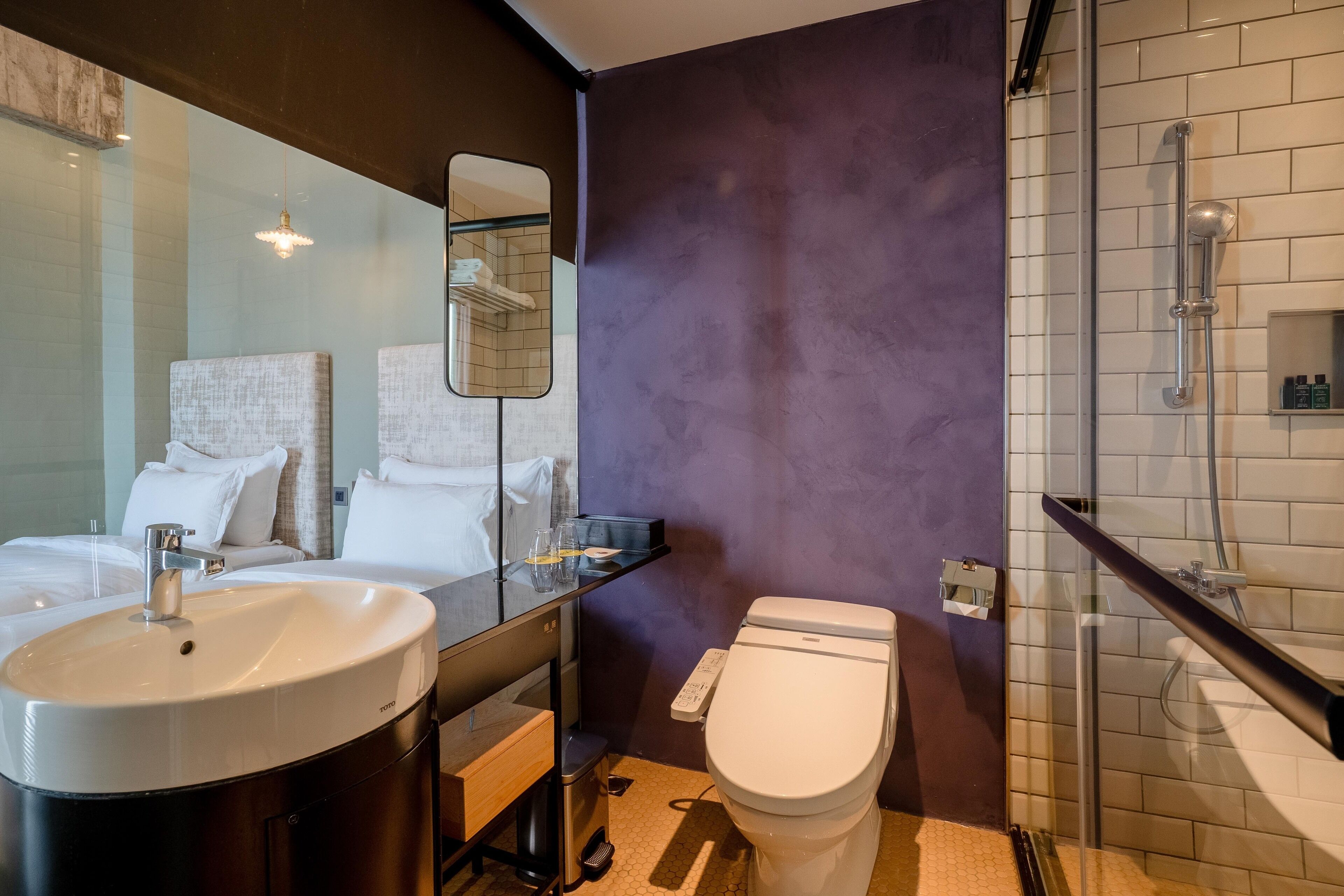 standard twin room | bathroom | hair dryer, electronic bidet, towels, shampoo