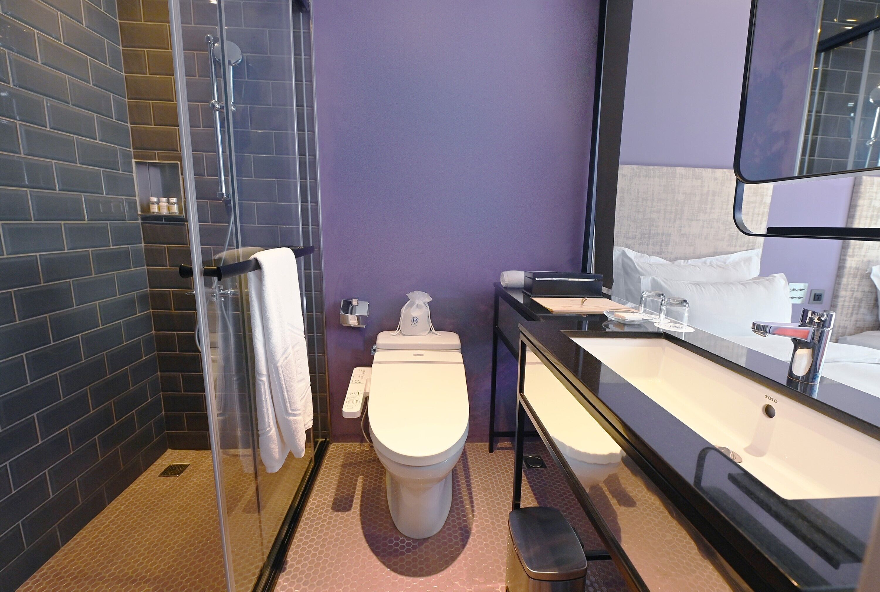 standard twin room | bathroom | hair dryer, electronic bidet, towels, shampoo